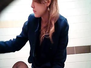 Beautiful teen girl caught by a toilet cam Picture 7