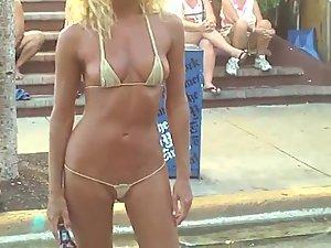 Sexy woman in a very skimpy bikini Picture 7