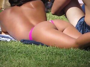 Yummy girl in pink thong and socks at the park Picture 3