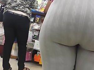Huge soft ass spied in a store