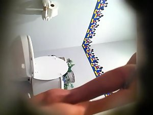 Dreamy girl spied while pissing on a toilet Picture 6
