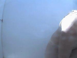 Hidden camera in the beach shower Picture 6