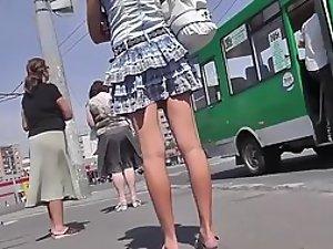 Innocent looking blonde on the bus stop