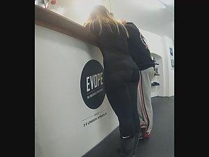 Big ass of hot girl leaning on counter in gym Picture 7