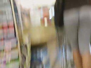 In cashier line behind a big black booty Picture 1