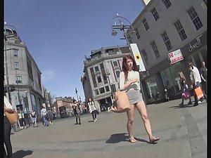 Miniskirt reveals redhead's hot ass Picture 7