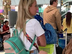 Sexy bombshell kind of blonde at the airport