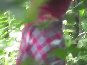 Spying a hot chick changing in the park Picture 8