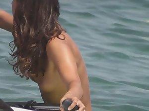 Pretty topless surfer got nice small tits Picture 1