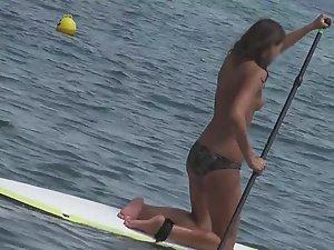 Pretty topless surfer got nice small tits Picture 7