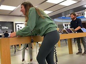 Breathtaking girl bends over a tall desk Picture 7