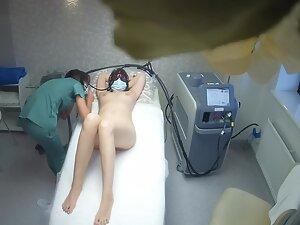 Spying on hot pussy opening during laser treatment Picture 1