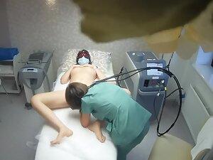 Spying on hot pussy opening during laser treatment Picture 4