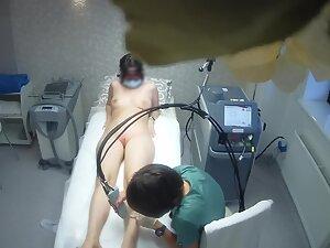 Spying on hot pussy opening during laser treatment Picture 6