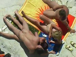 Swingers caught as they fuck on a beach Picture 3