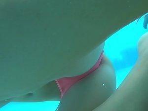 Voyeur swims around and films hot girl in water Picture 5
