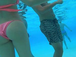 Voyeur swims around and films hot girl in water Picture 8