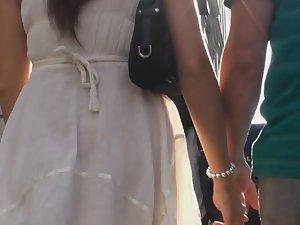 Wind blows white skirt away Picture 1