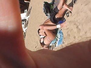 Sexy lace thong shows lots of pussy on beach Picture 8
