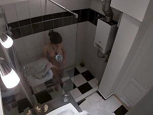 Spying on busty roommate in the shower Picture 1