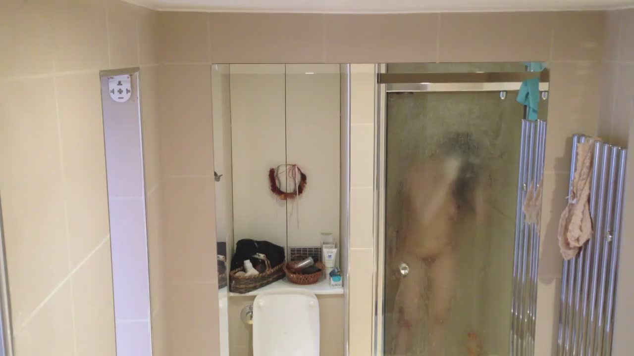 Big boobs caught after shower picture