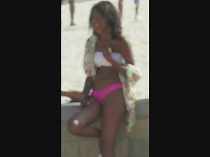 Slutty black girl on the beach in her pink thong Picture 4