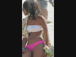 Slutty black girl on the beach in her pink thong Picture 6