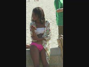 Slutty black girl on the beach in her pink thong Picture 8