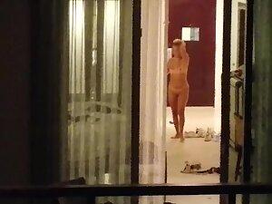 Peeping on two naked girls in a fancy apartment Picture 1