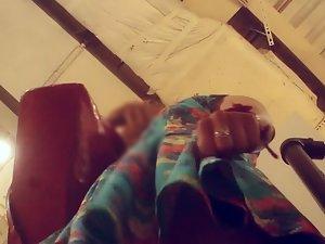 Upskirt of hot lady while she shops for clothes Picture 7