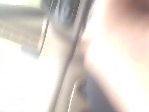 Hot milf filmed while cleaning her car Picture 5