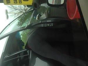 Hot milf filmed while cleaning her car Picture 6