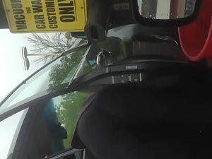 Hot milf filmed while cleaning her car Picture 7