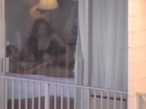 Voyeur zooms on sex in a hotel room Picture 2