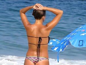 Tanned teen girl is erotic to watch on beach shower Picture 5