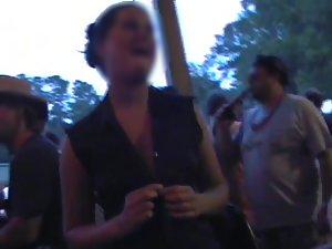 Girl flashes her tits in a crowd Picture 3