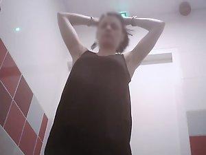 Curvy girl spied showering at work Picture 1