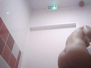 Curvy girl spied showering at work Picture 7