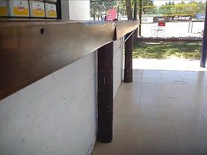 Big butt bends over in front of a beach voyeur Picture 7