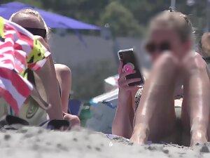 Hot girl realizes that beach voyeur is checking her out Picture 4