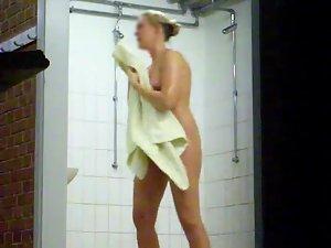 Smiling woman stepped out of a shower Picture 3