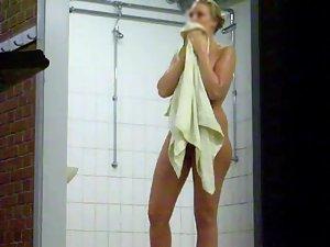 Smiling woman stepped out of a shower Picture 4
