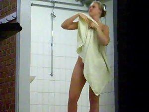 Smiling woman stepped out of a shower Picture 5