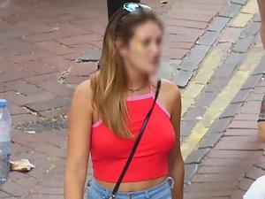 Braless tits defying gravity in red top Picture 3