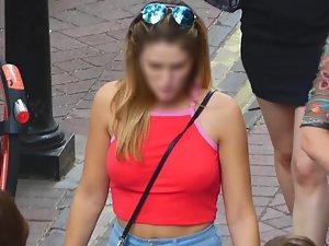Braless tits defying gravity in red top Picture 4