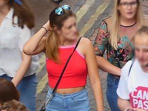 Braless tits defying gravity in red top Picture 5