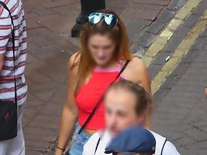 Braless tits defying gravity in red top Picture 6