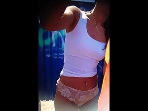 Tanned girl changes from bikini to white lace panties Picture 7
