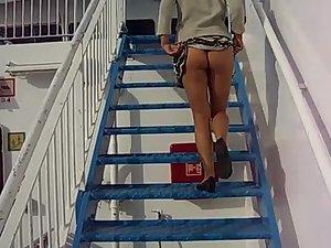 Wife teases her husband on the stairs Picture 7