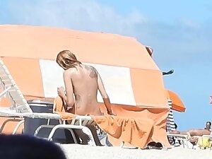 Voyeur can't stop looking at skinny nudist girl Picture 2